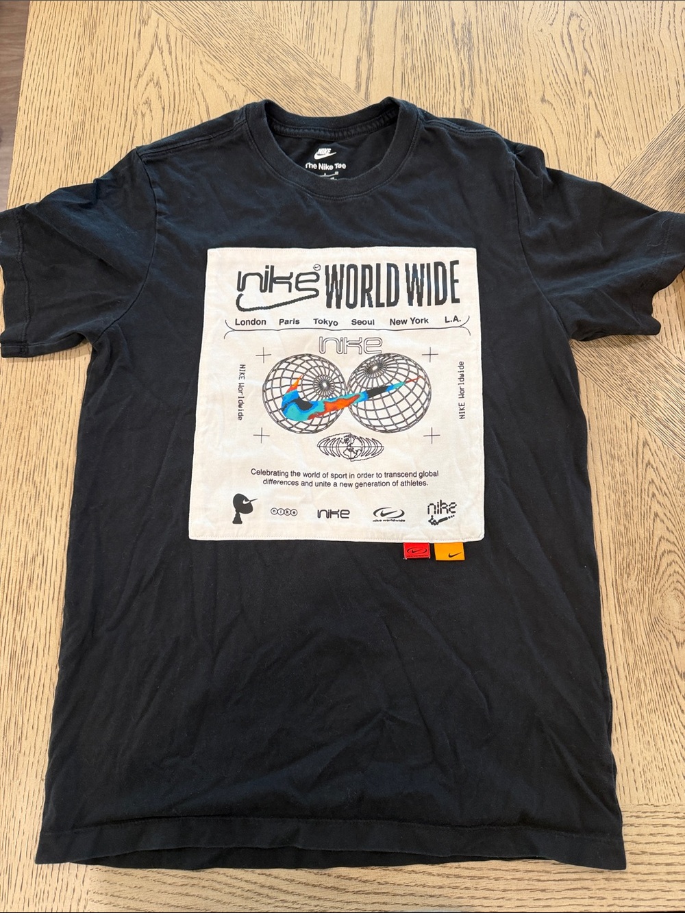 Nike Black Short-Sleeve 'World Wide' Graphic Tee with Multicolor Accent